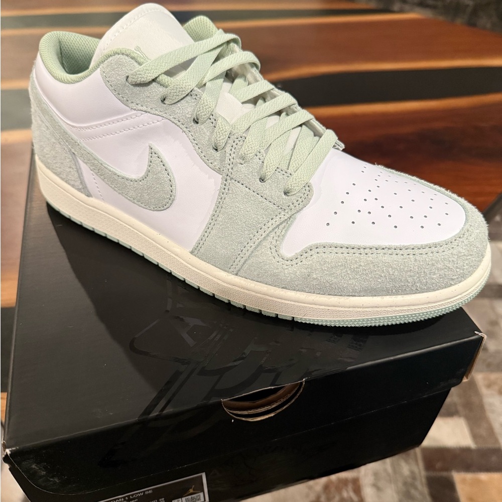 New, never worn jordans. White and seafoam green. Size 11.